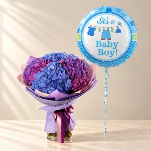 Blue and purple hydrangeas in lilac wrapping with one blue Baby Boy message balloon
